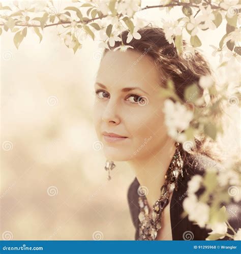 Beautiful Woman In A Spring Blooming Garden Stock Photo Image Of