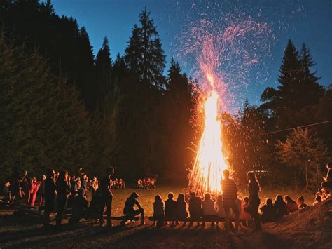 Time Lapse Photography Of A Burning Bonfire Surrounded By People In A