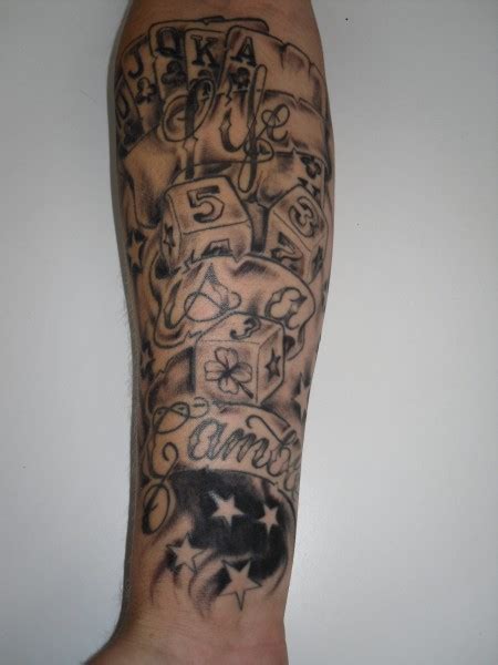This is a temporary tattoo of a black and white low rider car surrounded by flames, a pair of dice, playing cards, and a ribbon that reads life's a gamble. ole olstadt: LIFE IS A GAMBLE(neu) | Tattoos von Tattoo ...