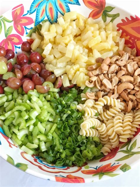 With refreshing cucumbers, crunchy almonds, sweet mandarin oranges, and a tangy homemade dressing, what's not to love about this pasta salad? Fruity Cashew Chicken Pasta Salad - Together as Family