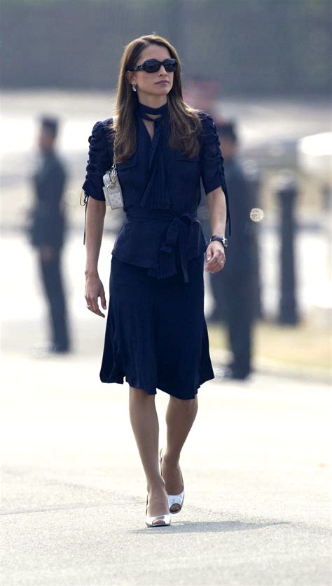 The Jordanian Monarch Queen Rania Keeps Things Polished In Prada Even For A Trip To A