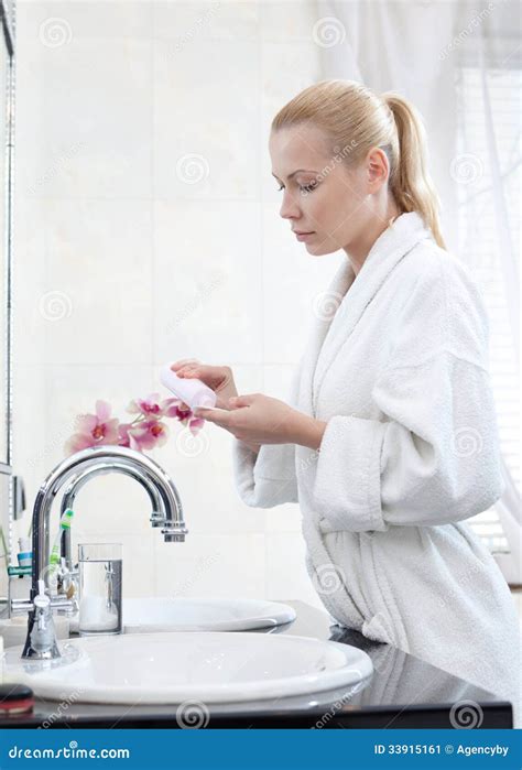 Young Girl Washes Face With Lotion Stock Image Image Of Bathroom