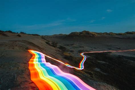 Vibrant Rainbow Roads Illuminate Forests And River Bends Into Magical