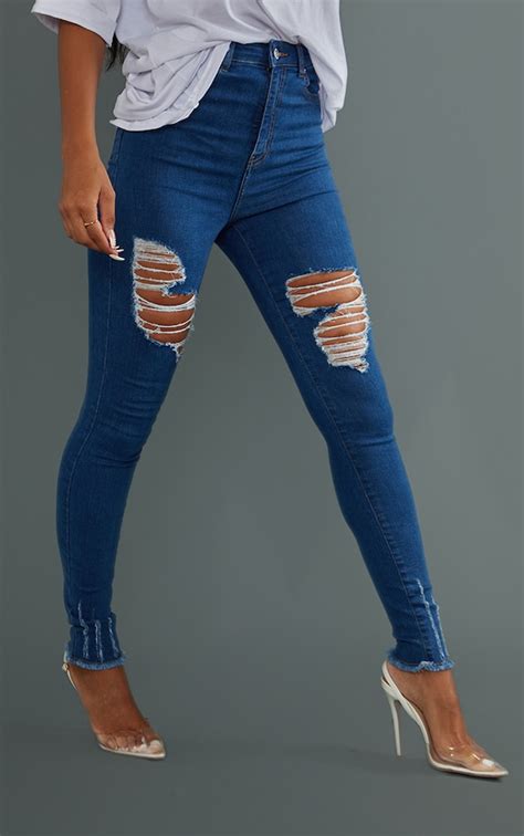 Prettylittlething Mid Blue Wash Ripped Hem 5 Pocket Skinny Jeans