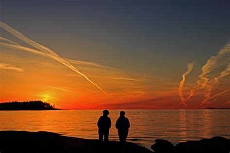 Two Friends Enjoying A Sunset Photograph By Randy Hall