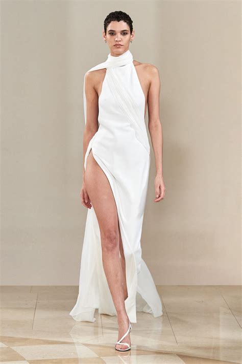 Ciara Stuns In Monot Spring 2022 White High Slit Dress At Elle Magazine