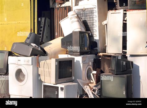 Dump the old broken appliances Stock Photo - Alamy