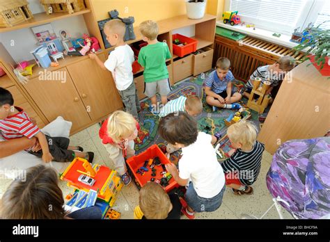Preschool Children Playing In Class With Toys Stock Photo Royalty Free