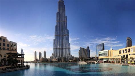 Wallpaper Khalifa Tower Dubai Sky Clouds Water Pool