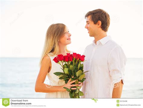 Romantic Young Couple In Love Man Giving Beautiful Young