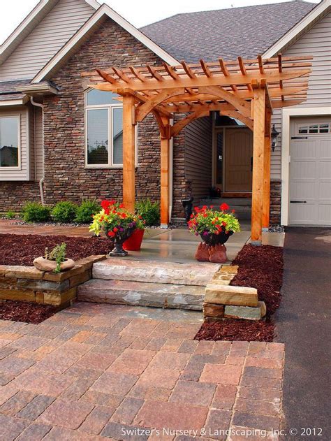 Custom Designed And Installed Natural Cedar Arbor At Front Entrance Of