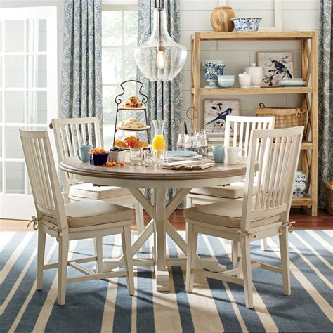 It's essential to have an extendable table! Grafton Extending Round Dining Table | Wayfair