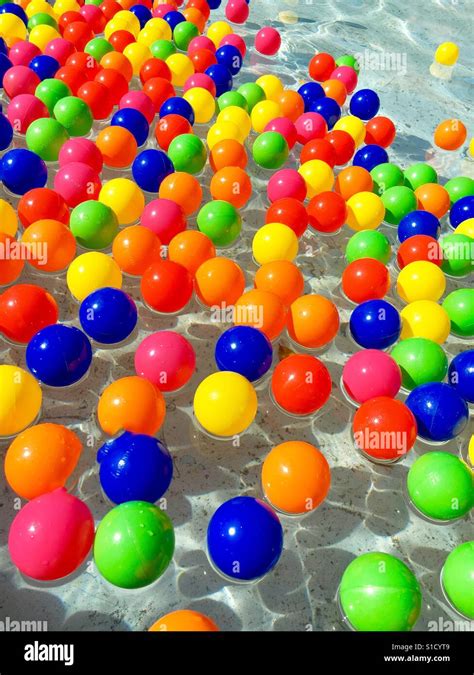 Balls Floating In Water Stock Photo Alamy