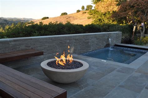 I would recommend getting a fire pit with a grill. Outdoor Living Design | Edge Studio Arts