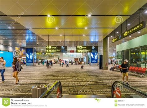 Visitors Walk Around Departure Hall In Changi Airport Singapore Stock