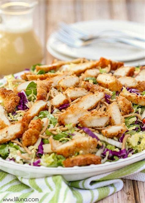 Applebee's oriental chicken salad is cornflake crusted chicken on a bed of greens and veggies topped with a sweet oriental honey mustard dressing! Copycat Applebee's Oriental Salad