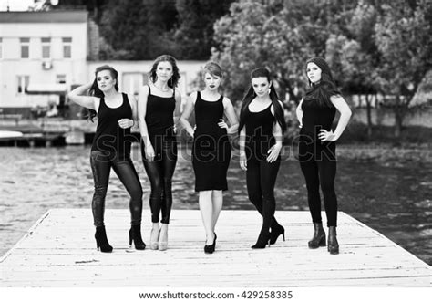 Five Beautiful Young Sexy Girls Models In Black Tight Dress Posing On