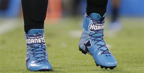 Cameron jerrell newton is an american football quarterback for the new england patriots of the national football league. Cam Newton Salutes the Charlotte Hornets with Under Armour ...