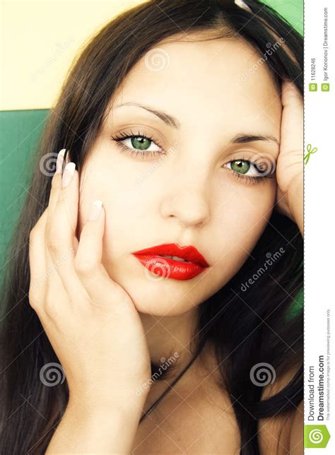 Beautiful Brunette Woman With Green Eyes Stock Photo