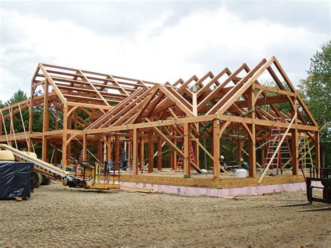 A House Being Built In The Middle Of A Construction Area With Wooden