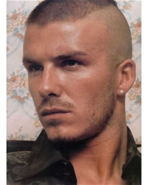Obviously, this has captured the attention of so many men and likely women. David Beckham with punky bald head.jpg