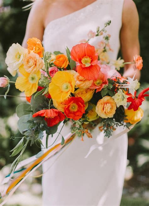 Our Favorite Bouquets From 2017 Poppy Yellow And Orange Bouquet