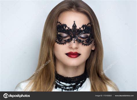 Woman Black Mask Stock Photo By ©olgaosa 173163820