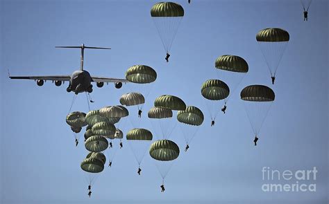 Us Army Paratroopers Jumping Photograph By Stocktrek Images