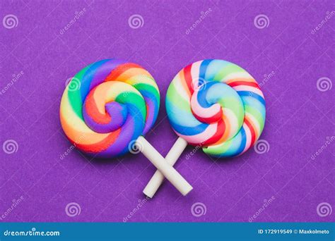 Colorful Candies Lollipops Isolated On Purple Background Festive