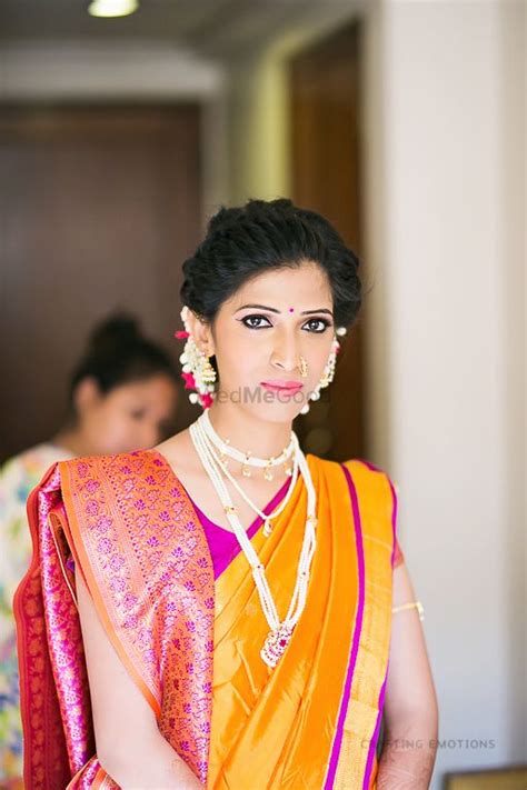 photo of marathi bride in yellow and purple saree