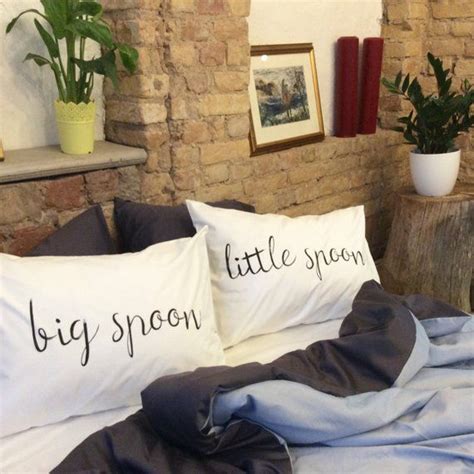 A man has designed a pillow for couples who struggle to stay comfortable while cuddling at night. Big spoon Little Spoon Spooning couple pillow cases 1st or 2nd year cotton anniversary gift for ...