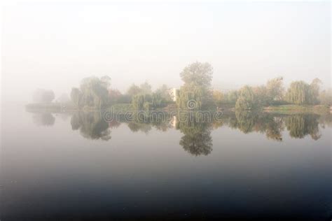 Morning Mist Over The Lake With Reflection In The Water Fog On A River