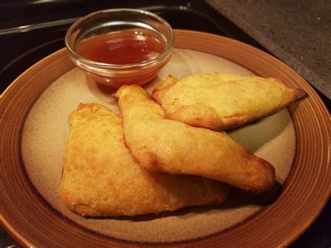 Remove from oven/microwave and top. Baked Crab Cream Cheese Wontons with Sweet n Sour sauce ...