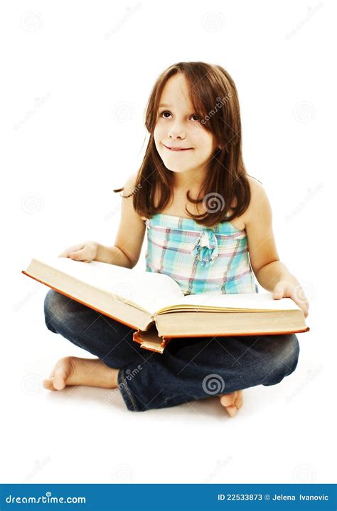 A Little Girl Reading A Book On The Floor Stock Image Image Of Little