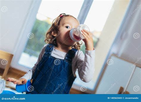 Child Drinking Juice From Bottle Stock Image Image Of Person Face