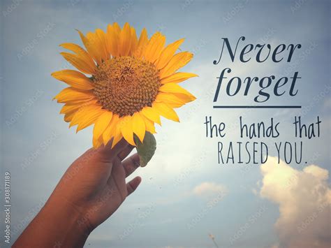 Inspirational Motivational Quote Never Forget The Hands That Raised