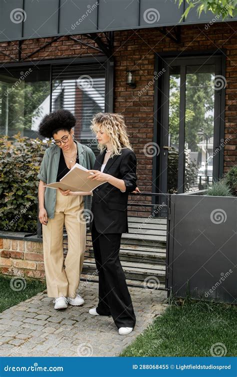 Blonde Real Estate Agent Showing Documents Stock Image Image Of Home