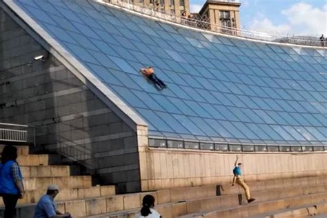 Teens Rushed To Hospital After Video Shows Them Slide Off Glass Roof