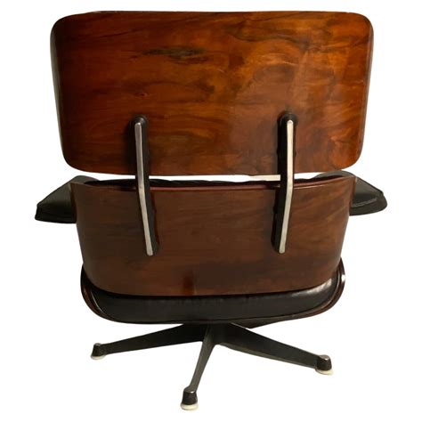 Charles Eames, Lounge Chair in black leather by Herman Miller For Sale