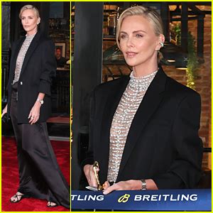 Charlize Theron Wears A Daring Pearl Top For Breitlings Boutique