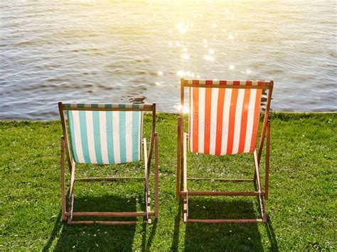 Same day delivery to 60601. Chairs On The Sandy Beach Near River. Summer Holiday And Vacation Stock Image - Image of outdoor ...
