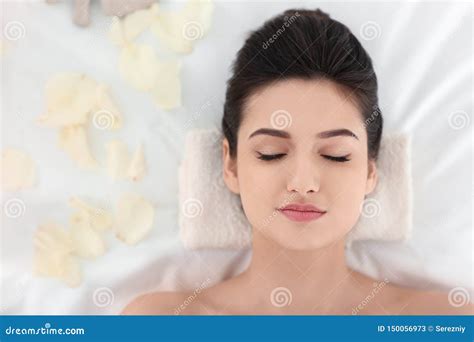 Young Woman Relaxing On Massage Table At Spa Salon Top View Stock Image Image Of Indoors