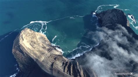 Humpback and minke whales cavort and feed in the waters around the impressive volcanic island of jan mayen with its towering ebony peaks and. Jan Mayen drone movie HD - YouTube