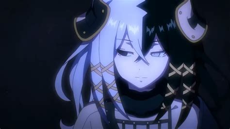 An Anime Character With Long Black Hair And Horns On Her Head Staring