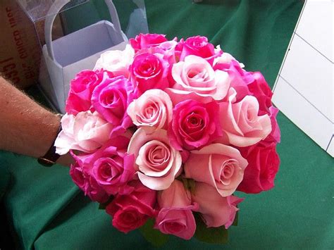 Hot pink and black are two very contrasting colors that work well for each other. Bridal Bouquet | Pink wedding flowers, Pink rose wedding ...