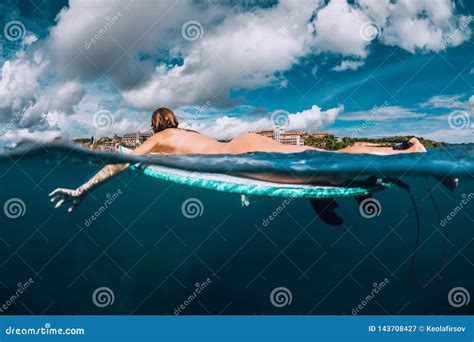 Surf Girl Floats On Surfboard Naked Woman During Surfing Stock Image