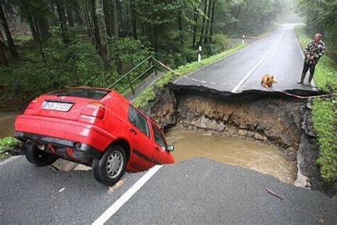 Jaw Dropping Pictures Of Sinkholes Swallowing Cars Made Us