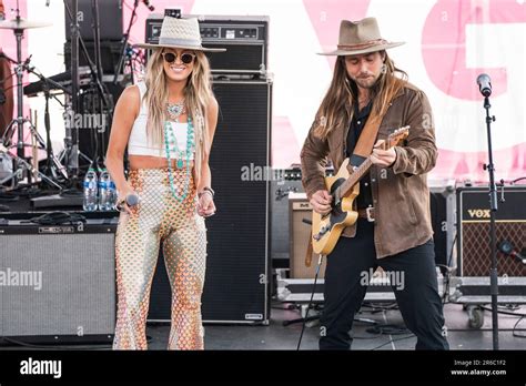Lainey Wilson Left And Lukas Nelson Perform During The 2023 Cma Fest
