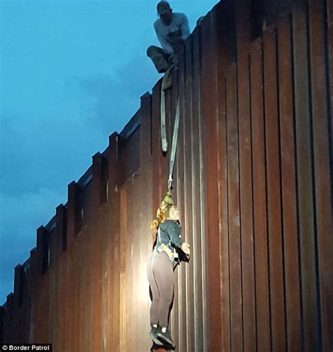 Mexican Woman Is Left Dangling On Border Wall Daily Mail Online