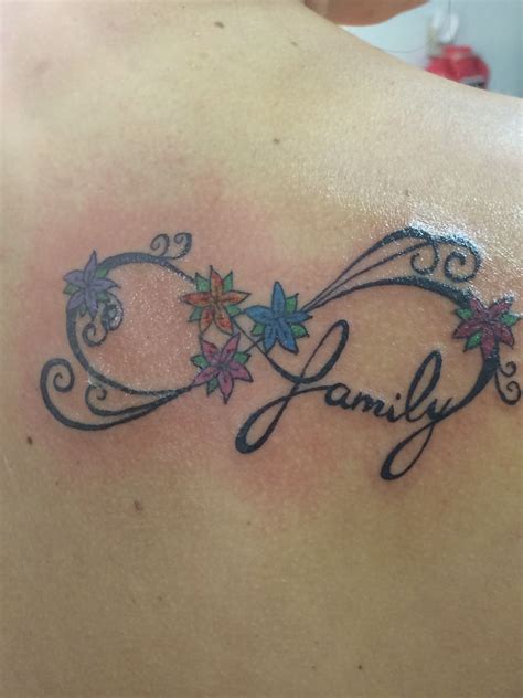 Infinity tattoos are getting popularity because of its unique design. Family infinity tattoo. Each flower represents one of my siblings and 1 for my mom | Infinity ...